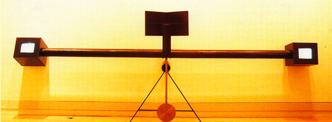 Video See-Saw (1988) by Buky Schwartz — Video installation